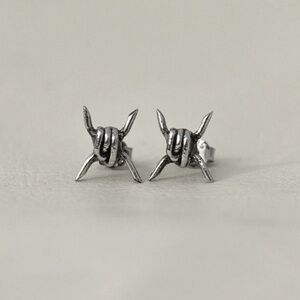 Reposeux Barb wire stud earrings in sterling silver